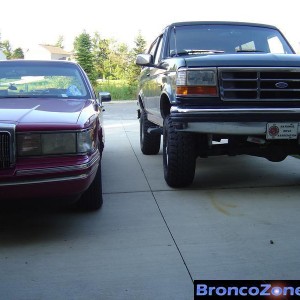 Bronco next to Father-in-Laws Towncar